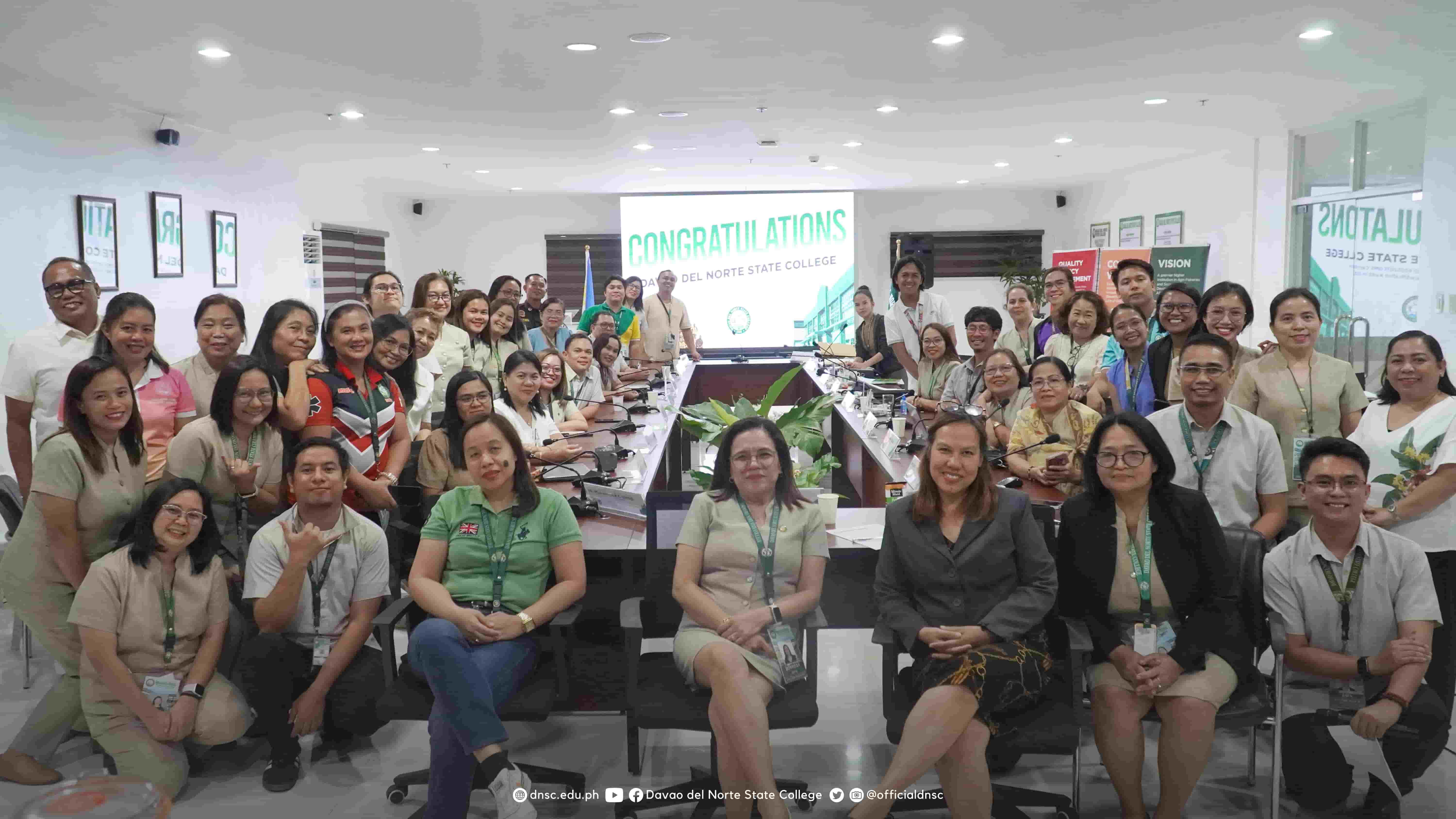 DNSC personnel, alongside Ms. David, marking the successful conclusion of the ISO audit. Photo by Randy Magayon, DNSC PIO.