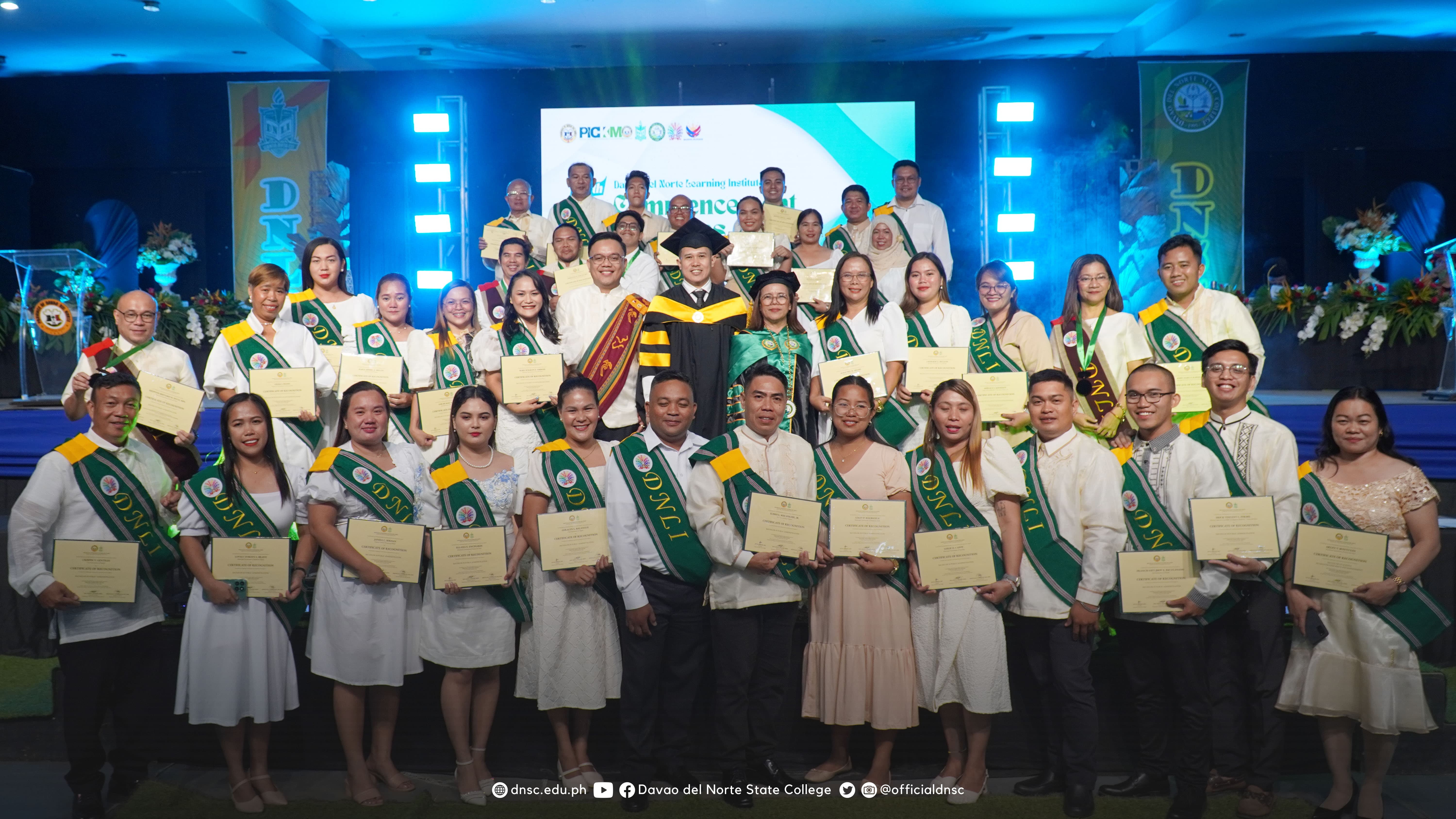 Graduates of the DNSC-DNLI Special Adult Education Program together with Dr. Joy M. Sorrosa. Photo by Randy Magayon, DNSC PIO.