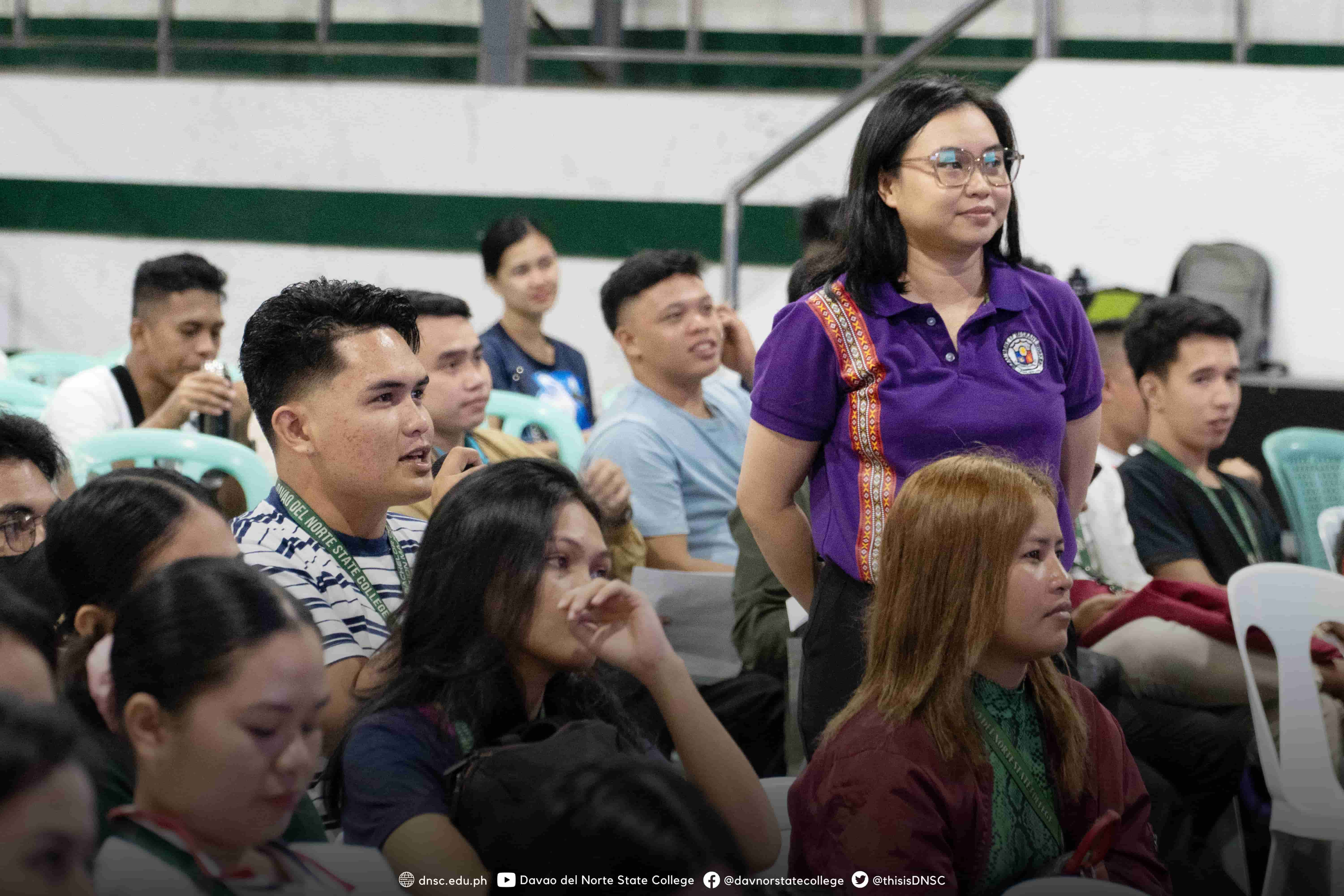 Maia Nneka L. Piñol-Tubil (standing) with the job seekers. Photo by Randy Magayon, DNSC PIO.